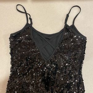 Beautiful Black sleeveless sequin cocktail dress with tassels
